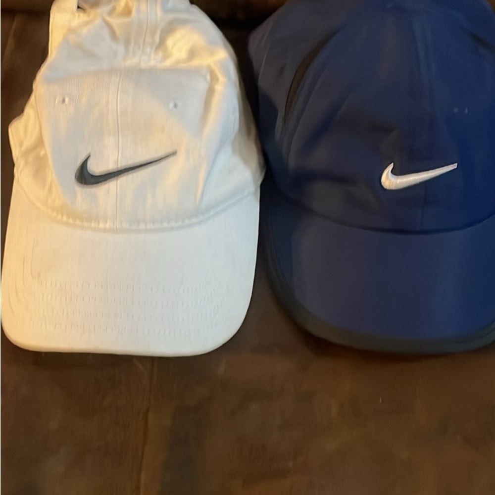 Two pair of Toddler Nike Hats.